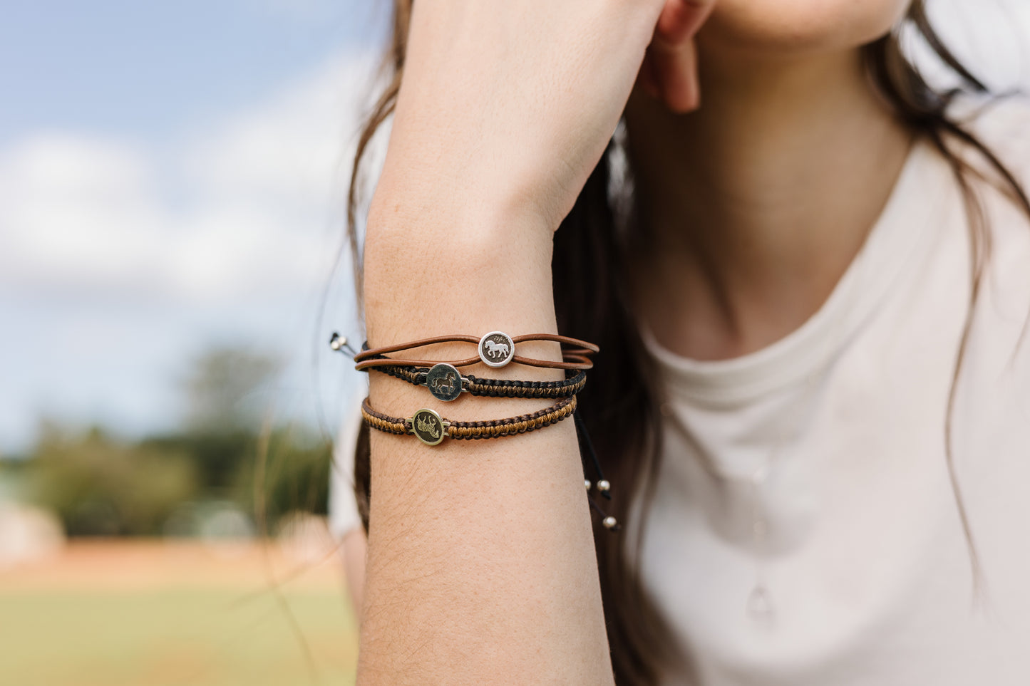 Round Disk Pendant with filigree horse on Wax Cord